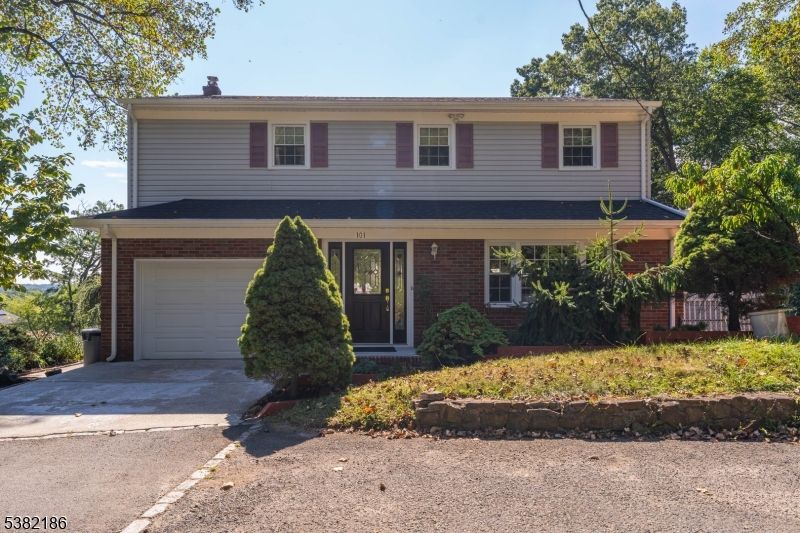 Attached, Exterior, Facade, Brick Facade, American Foursquare