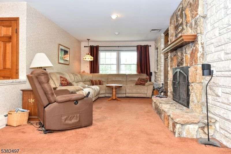 Fireplace, Interior, Living room, Pendant Lights, Recessed Lighting, Stone Walls