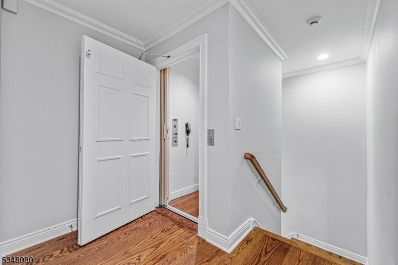 Elevator, Interior, Recessed Lighting, Wood Texture Flooring