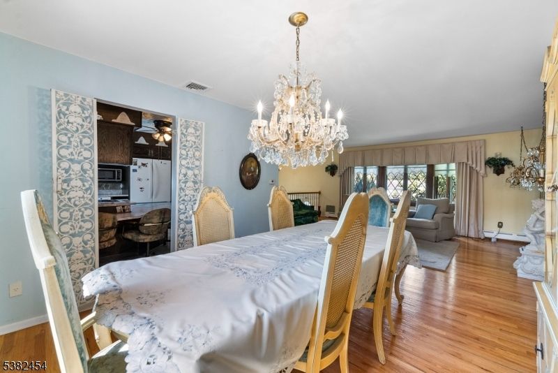 Chandelier, Dining room, Interior, Wood Texture Flooring