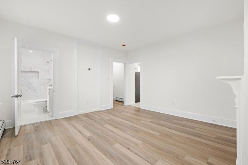 Bathroom, Empty room, Interior, Marble Walls, Recessed Lighting, Wood Texture Flooring