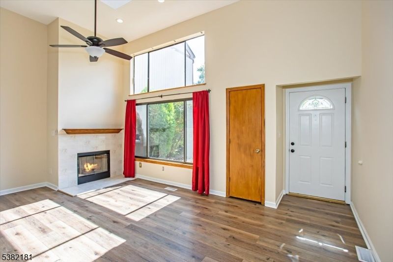 Empty room, Fireplace, Interior, Recessed Lighting, Wood Texture Flooring