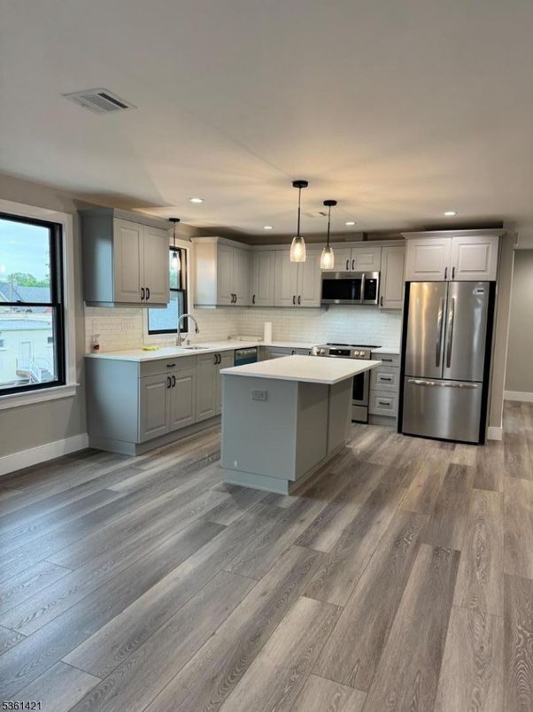 Interior, Kitchen, Pendant Lights, Recessed Lighting, Stainless Steel Appliances, Wood Texture Flooring