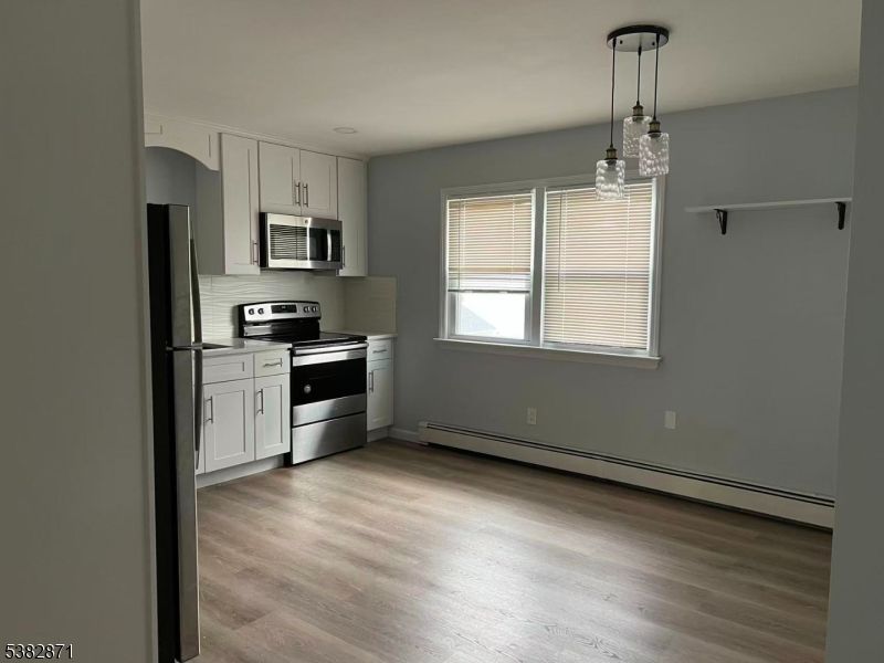 Interior, Kitchen, Pendant Lights, Stainless Steel Appliances, Wood Texture Flooring