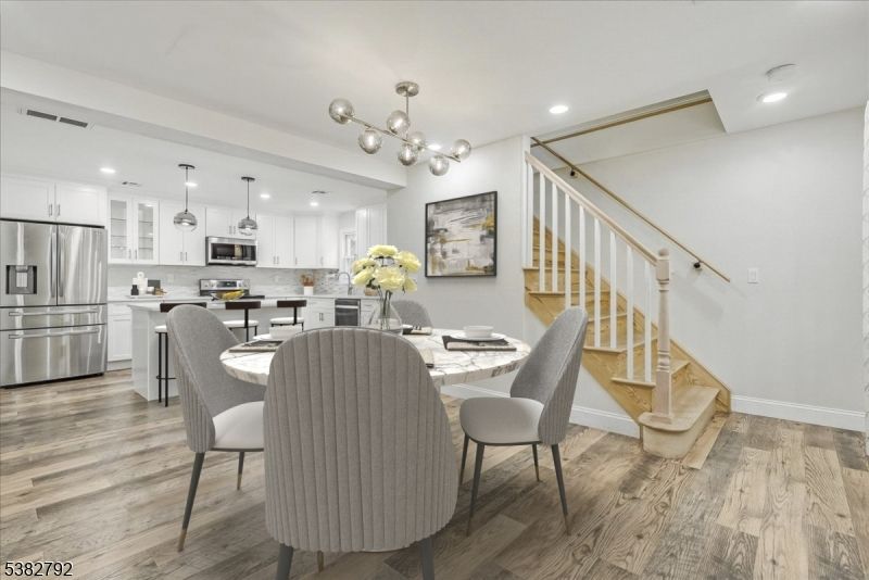 Dining room, Interior, Kitchen, Pendant Lights, Recessed Lighting, Stainless Steel Appliances, Wood Texture Flooring