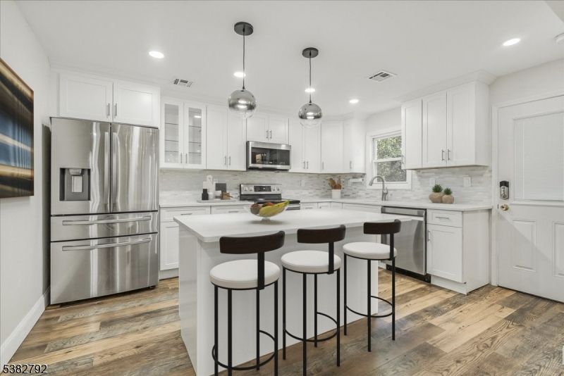Interior, Kitchen, Pendant Lights, Recessed Lighting, Stainless Steel Appliances, Wood Texture Flooring