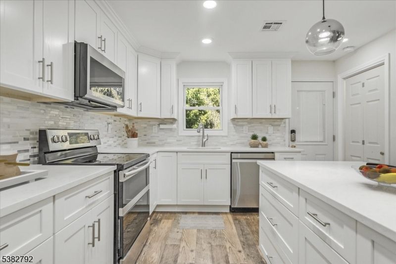 Interior, Kitchen, Pendant Lights, Recessed Lighting, Stainless Steel Appliances, Wood Texture Flooring