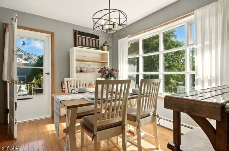 Chandelier, Dining room, Interior, Wood Texture Flooring