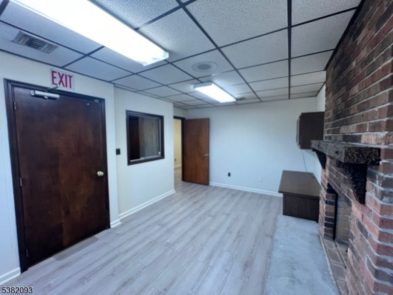 Empty room, Fireplace, Interior, Stone Walls, Wood Texture Flooring