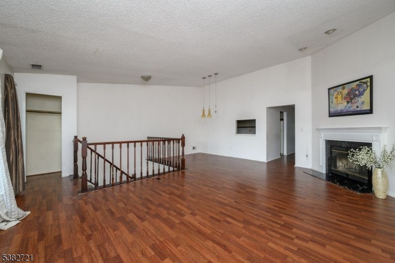 Empty room, Fireplace, Interior, Pendant Lights, Wood Texture Flooring