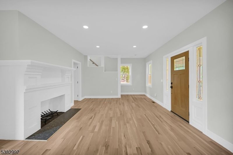 Empty room, Fireplace, Interior, Recessed Lighting, Wood Texture Flooring