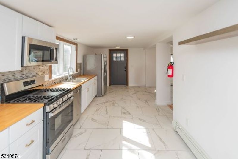 Interior, Kitchen, Marble, Pendant Lights, Recessed Lighting, Stainless Steel Appliances