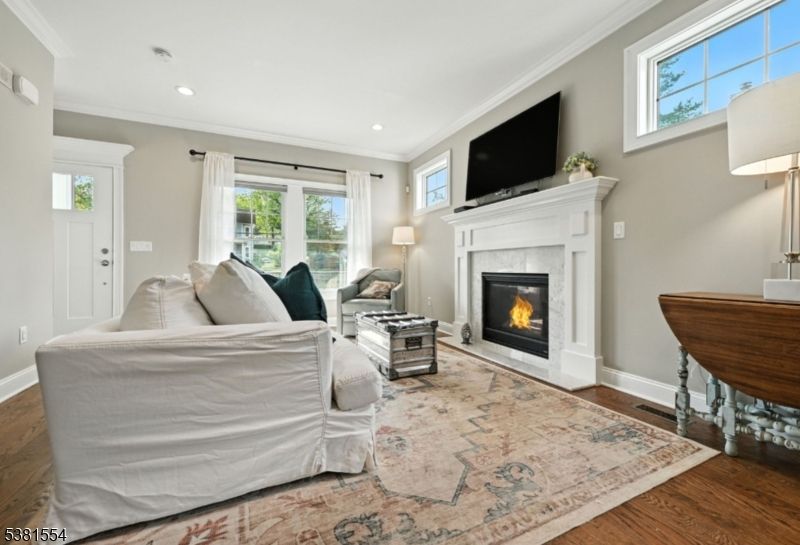 Bedroom, Fireplace, Interior, Living room, Recessed Lighting, Wood Texture Flooring