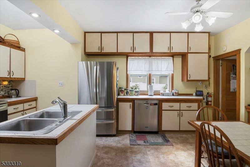 Interior, Kitchen, Recessed Lighting, Stainless Steel Appliances, Tile Countertops
