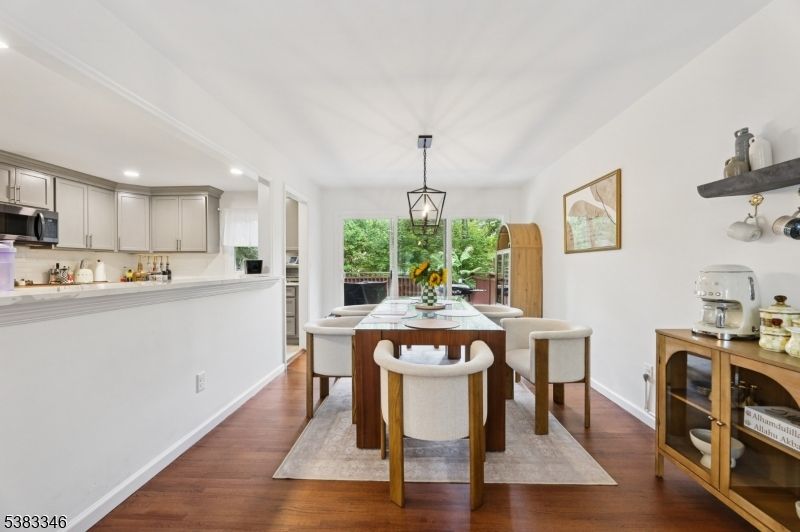 Dining room, Interior, Kitchen, Pendant Lights, Recessed Lighting, Stainless Steel Appliances, Wood Texture Flooring