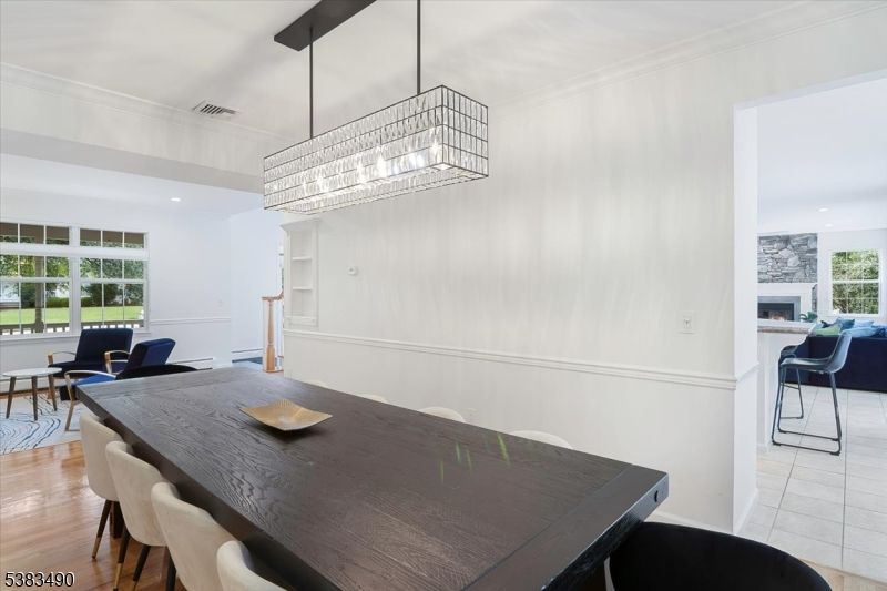 Chandelier, Dining room, Fireplace, Interior, Living room, Recessed Lighting, Wood Texture Flooring