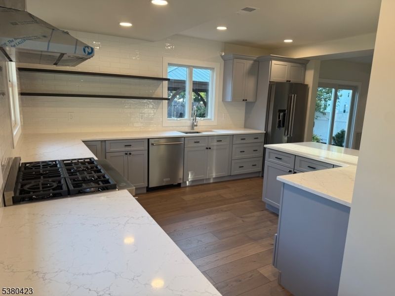 Interior, Kitchen, Recessed Lighting, Stainless Steel Appliances, Wood Texture Flooring