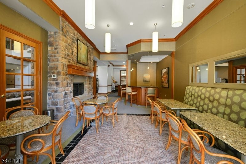 Dining room, Fireplace, Interior, Pendant Lights, Recessed Lighting, Stone Walls