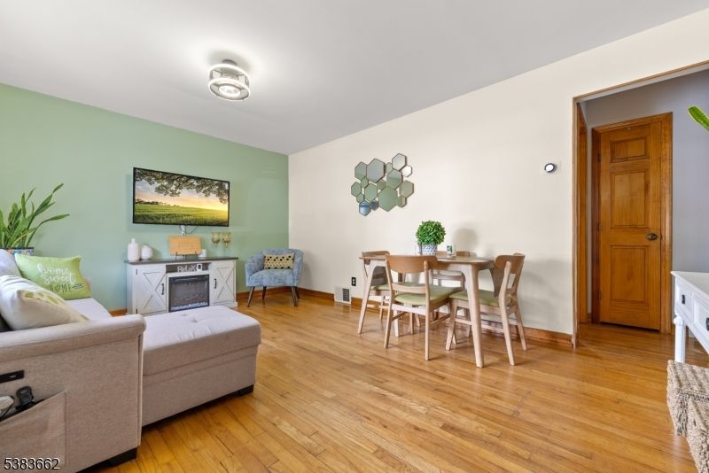 Dining room, Fireplace, Interior, Living room, Wood Texture Flooring