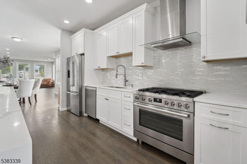 Dining room, Interior, Kitchen, Recessed Lighting, Stainless Steel Appliances, Wood Texture Flooring