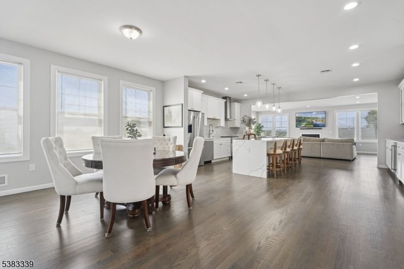 Dining room, Interior, Kitchen, Living room, Pendant Lights, Recessed Lighting, Stainless Steel Appliances, Wood Texture Flooring