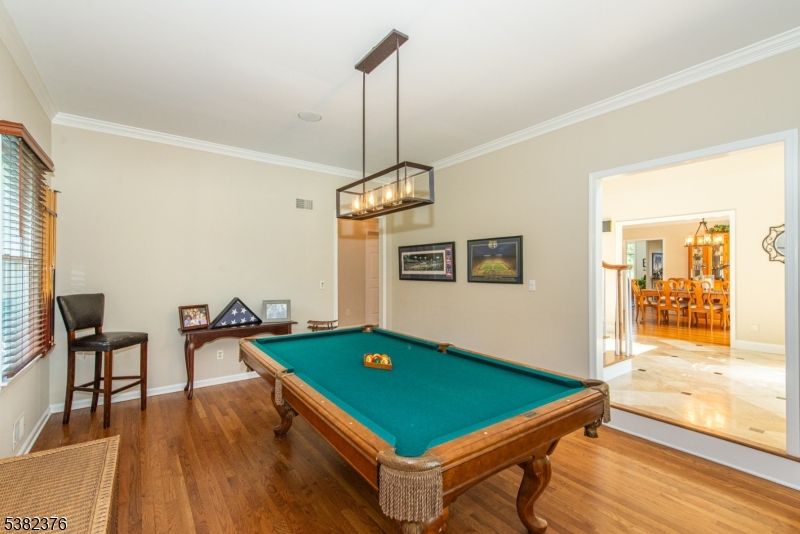 Billiard Table, Chandelier, Game Room, Interior, Pendant Lights, Wood Texture Flooring