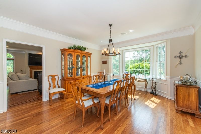 Chandelier, Dining room, Fireplace, Interior, Living room, Recessed Lighting, Wood Texture Flooring