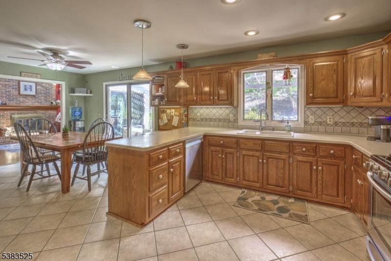 Dining room, Fireplace, Interior, Kitchen, Pendant Lights, Recessed Lighting, Stone Walls