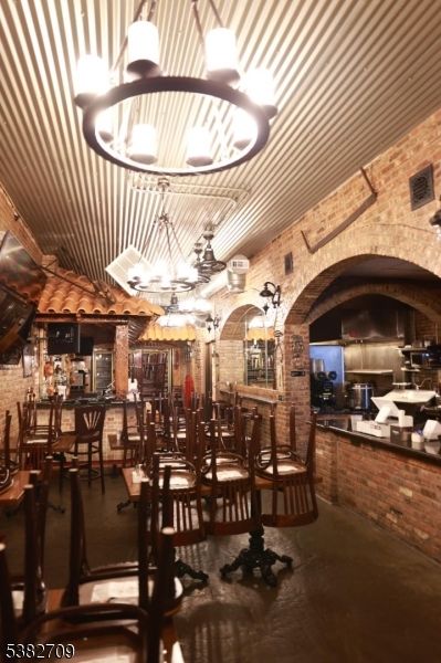 Chandelier, Dining room, Interior, Stone Walls