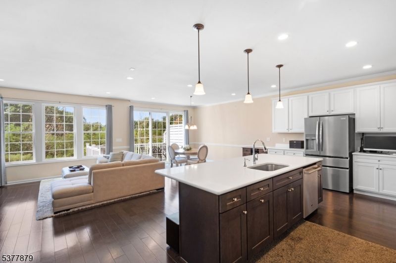 Dining room, Interior, Kitchen, Living room, Pendant Lights, Recessed Lighting, Stainless Steel Appliances, Wood Texture Flooring