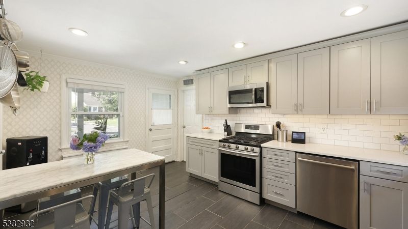Interior, Kitchen, Recessed Lighting, Stainless Steel Appliances, Wood Texture Flooring