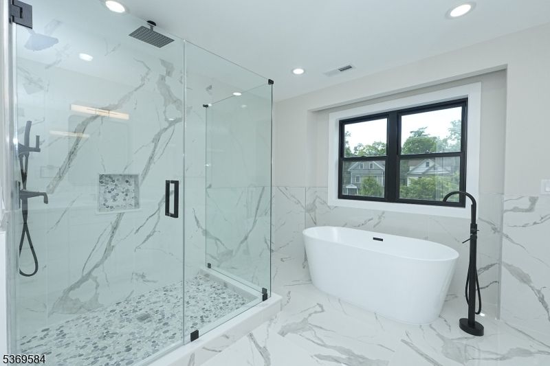 Bathroom, Free Standing Baths, Glass Shower, Interior, Marble, Marble Walls, Recessed Lighting