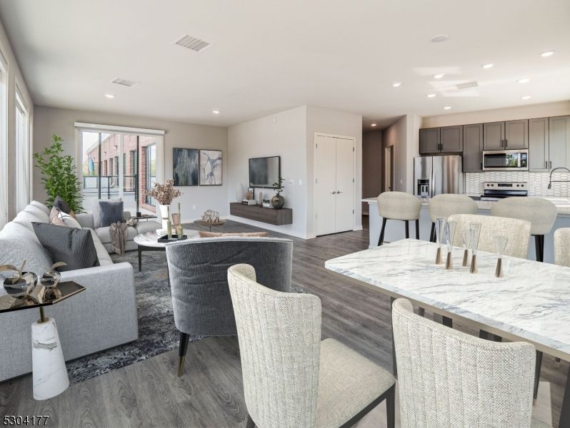 Dining room, Interior, Kitchen, Living room, Recessed Lighting, Stainless Steel Appliances, Wood Texture Flooring
