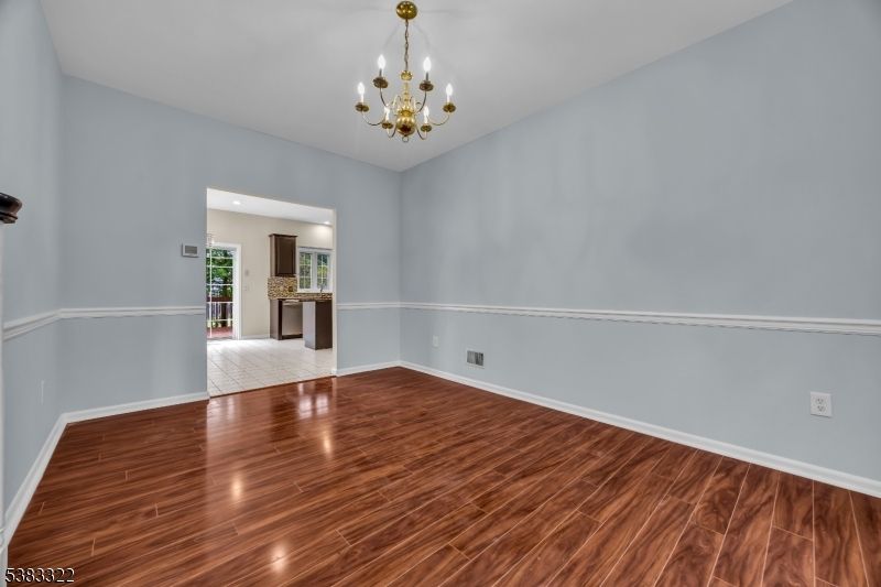 Chandelier, Empty room, Interior, Kitchen, Recessed Lighting, Wood Texture Flooring