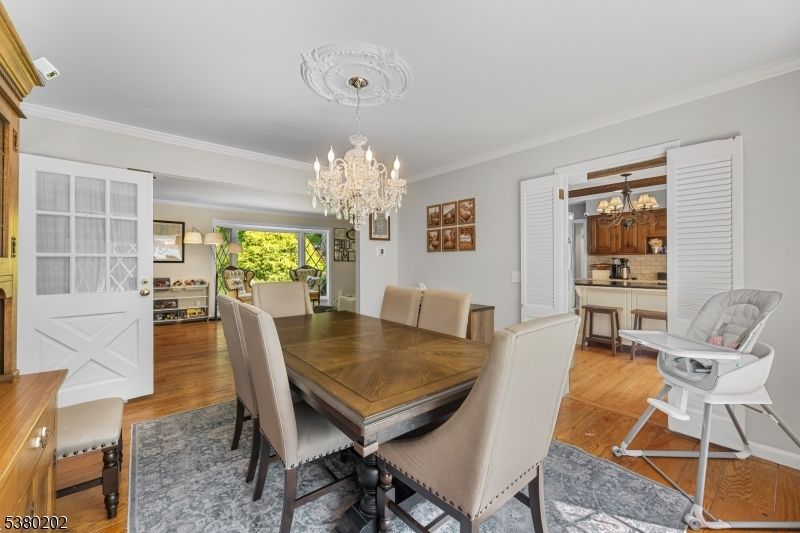 Chandelier, Dining room, Interior, Wood Texture Flooring