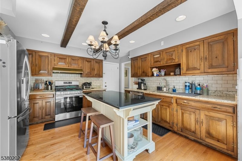 Chandelier, Interior, Kitchen, Recessed Lighting, Stainless Steel Appliances, Wooden Beams, Wood Texture Flooring