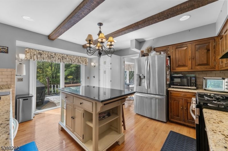 Chandelier, Interior, Kitchen, Recessed Lighting, Stainless Steel Appliances, Wooden Beams, Wood Texture Flooring