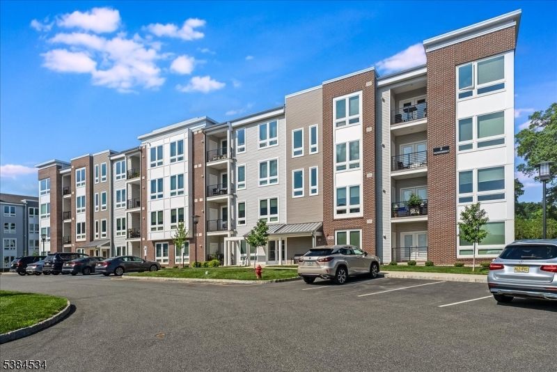 Exterior, Facade, Brick Facade, Condo Building
