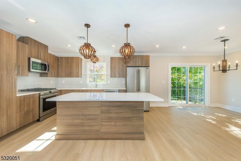 Interior, Kitchen, Pendant Lights, Recessed Lighting, Stainless Steel Appliances, Wood Texture Flooring