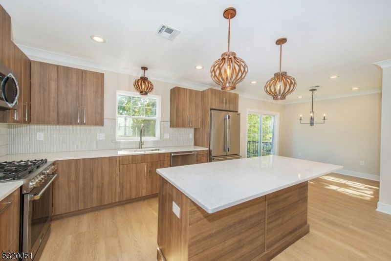 Interior, Kitchen, Pendant Lights, Recessed Lighting, Stainless Steel Appliances, Wood Texture Flooring