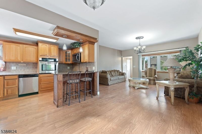 Chandelier, Interior, Kitchen, Living room, Stainless Steel Appliances, Wood Texture Flooring