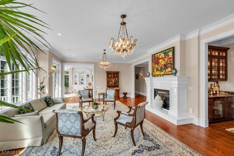 Chandelier, Dining room, Fireplace, Interior, Living room, Recessed Lighting, Wood Texture Flooring