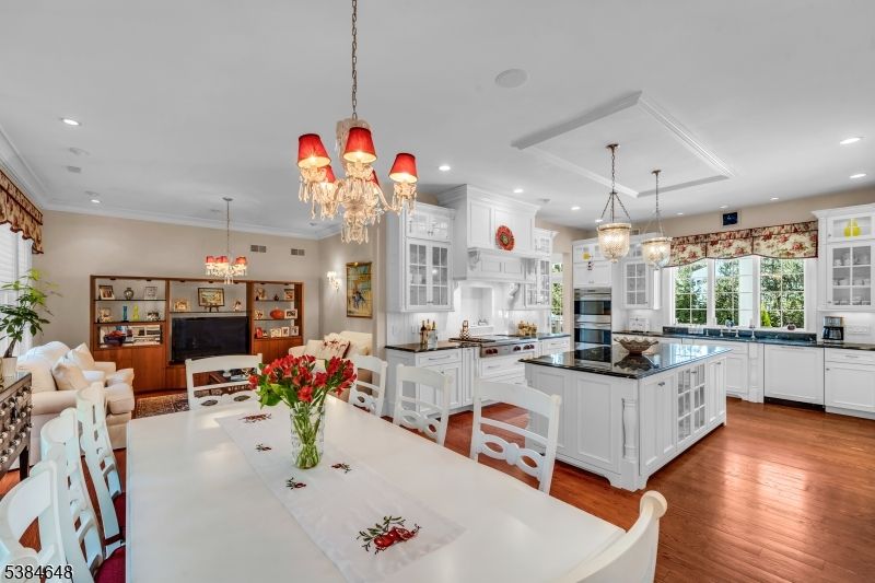 Chandelier, Dining room, Interior, Kitchen, Living room, Pendant Lights, Recessed Lighting, Wood Texture Flooring