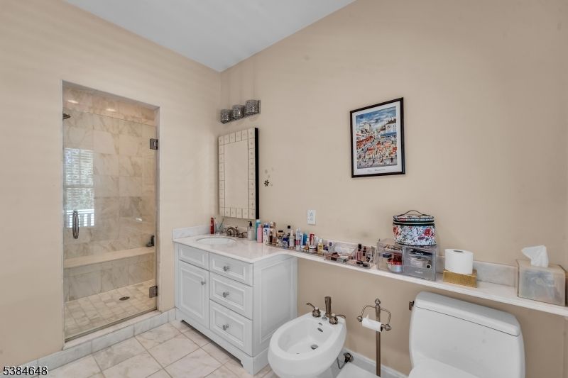 Bathroom, Dual Sink Vanities, Glass Shower, Interior, Marble Walls