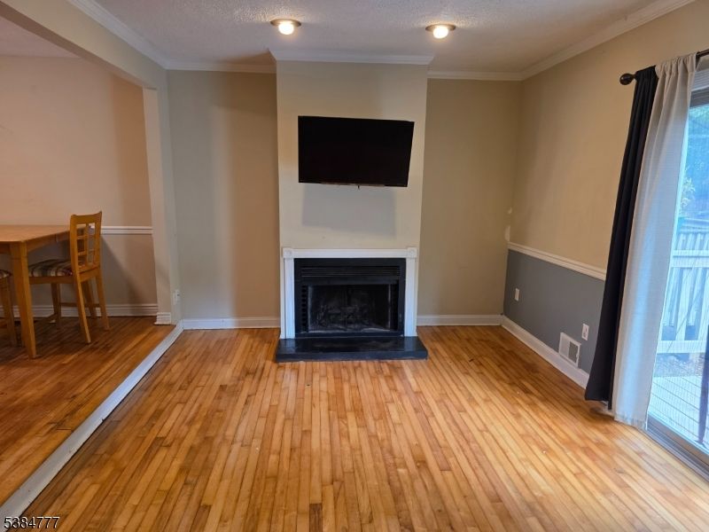 Dining room, Fireplace, Interior, Recessed Lighting, Wood Texture Flooring