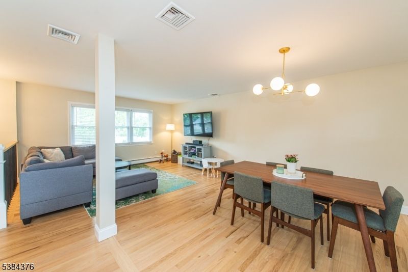 Dining room, Interior, Living room, Pendant Lights, Wood Texture Flooring