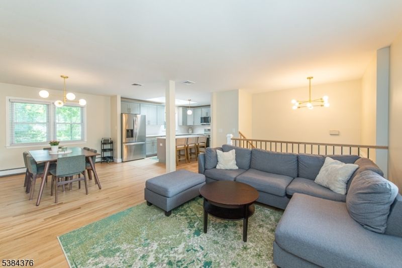 Dining room, Interior, Kitchen, Living room, Pendant Lights, Stainless Steel Appliances, Wood Texture Flooring