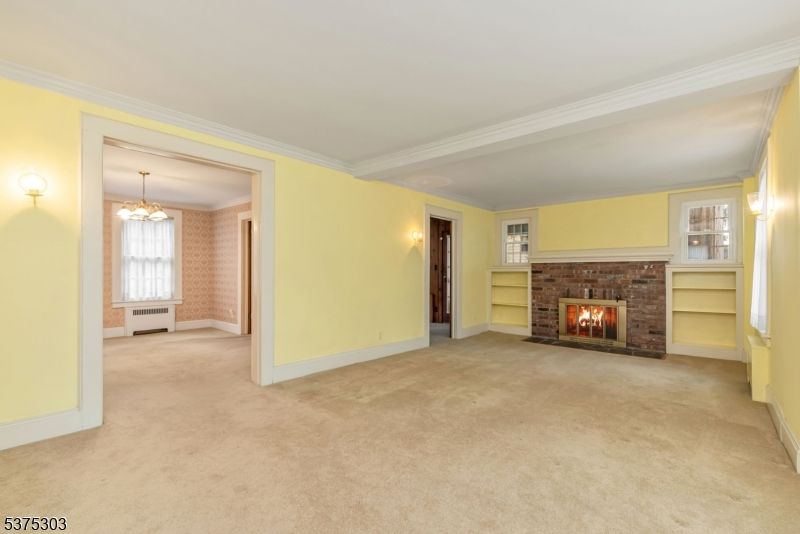 Chandelier, Empty room, Fireplace, Interior