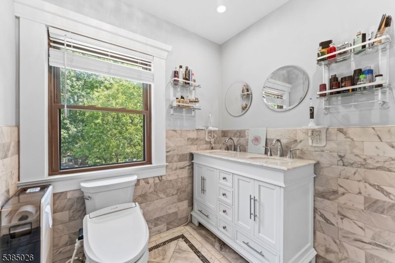 Bathroom, Dual Sink Vanities, Interior, Marble Walls, Recessed Lighting