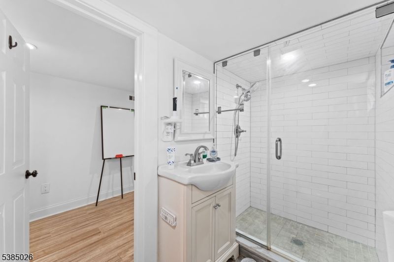 Bathroom, Glass Shower, Interior, Recessed Lighting, Wood Texture Flooring